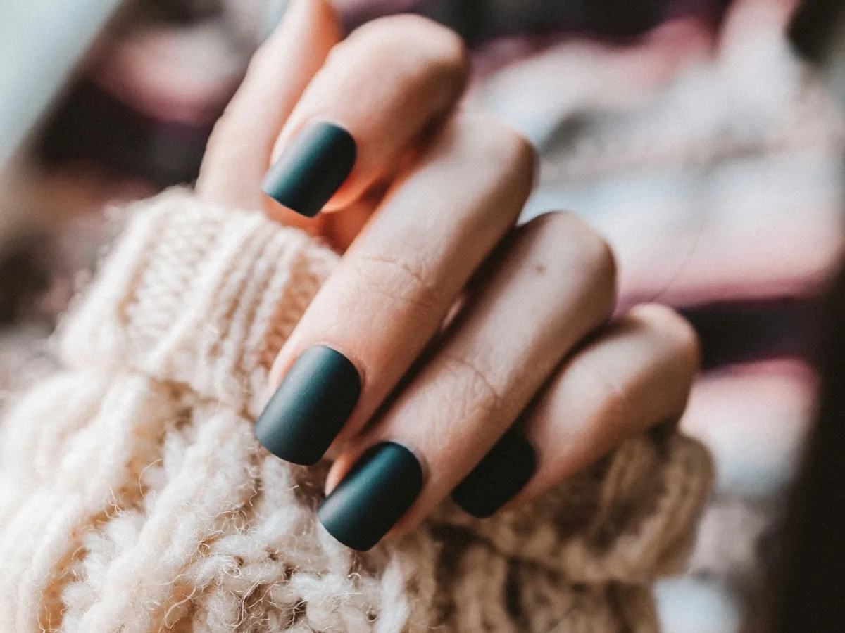 Close-up of a dull, low-shine nail polish finish compared to a glossy one