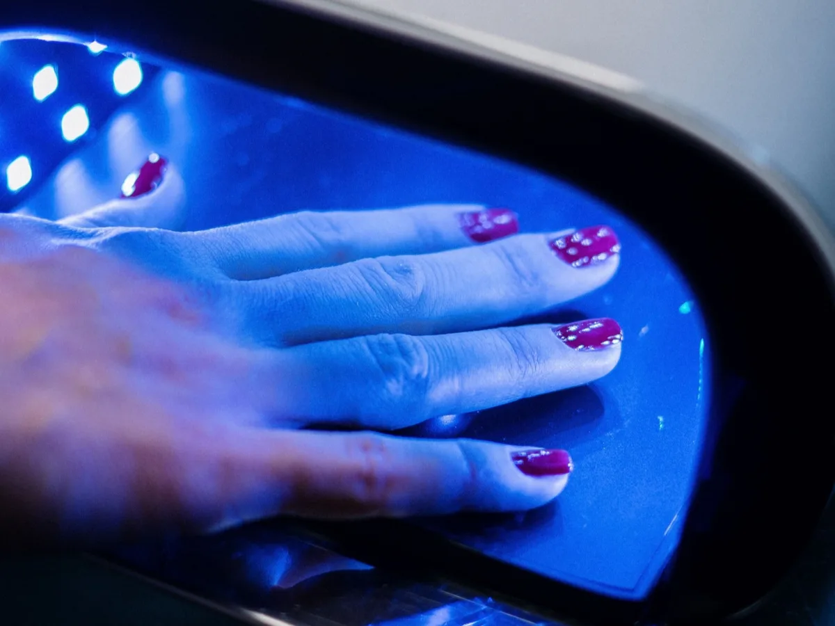 Close-up of a dull, low-shine nail polish finish compared to a glossy one